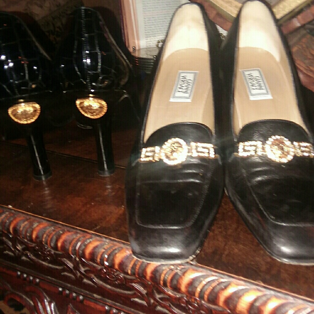 BLACK VERSACE HEELS. I'M ASKING $150.00 FOR EACH P